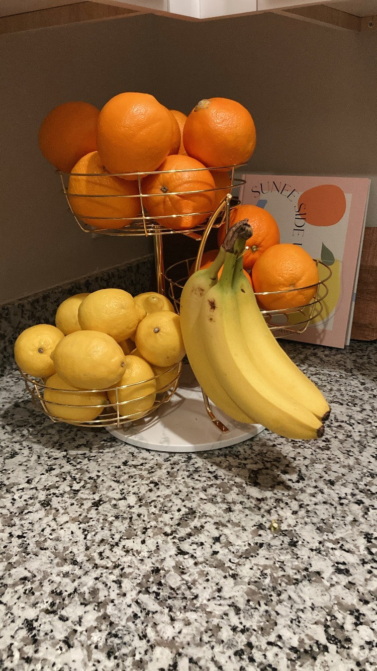 Organizing my countertop was a must! I couldn't stand my fruit rolling all over the place. I found this beautiful gold and marble fruit and vegetable organizer! 

 #LTKmomlife #LTKHome #LTKFindsUnder50