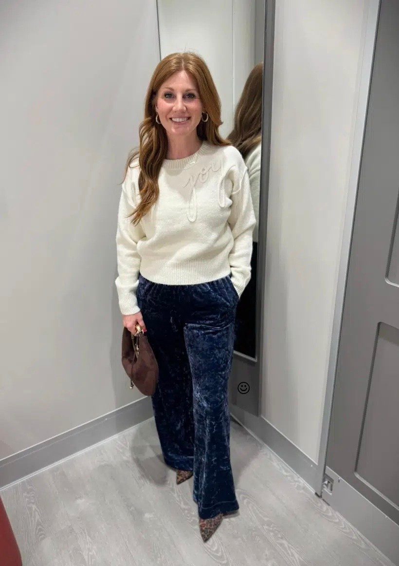 Stephanie is styling some of her favorites from Target! Her cream sweater is a size small and so are the crushed velour pull on pants. 

#LTKPetite #LTKootd #LTKHoliday