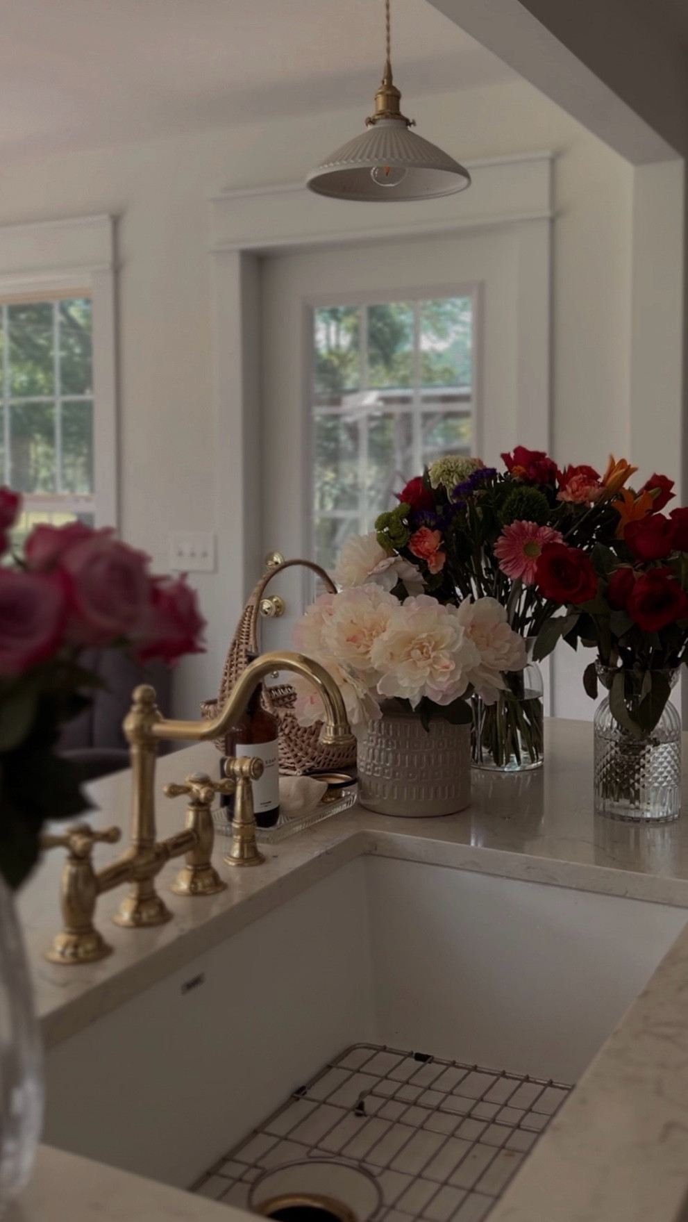 Birthday flowers all around the kitchen sink — is there anything sweeter? 🌸✨ 

Fresh blooms make even daily chores feel beautiful, and I’ll never get tired of finding little ways to add joy to everyday life.

I’ve linked our kitchen sink + faucet fixtures (so many of you ask about these!) and also rounded up affordable vases, pitchers, and vessels you can mix and match for fresh flowers. 

Because honestly… can you ever have too many vases? (The answer is, of course, no.) 

Perfect for kitchen styling, everyday home decor, and simple seasonal refreshes. 🌸 

#LTKHome #LTKParties #LTKSeasonal