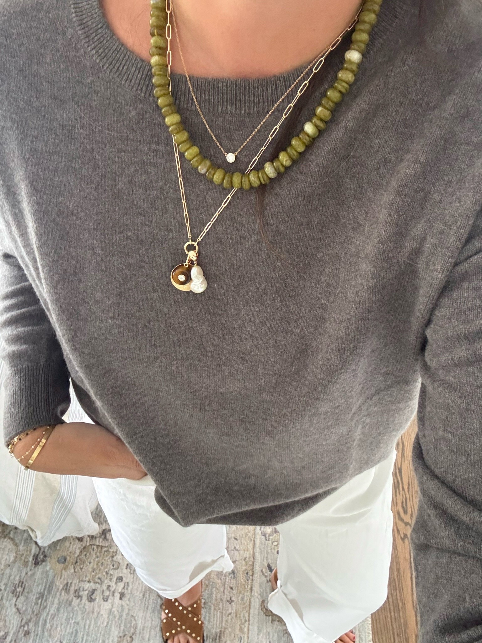 This necklace stack is such a beautiful fall accessory moment. I love the mix of the olive beads, delicate gold layers, and personalized charms. It adds the perfect amount of texture and personality to a simple sweater.

fall necklace stack, layered necklaces, beaded necklace, charm necklace, gold jewelry, fall accessories, sweater jewelry, everyday jewelry, jewelry layering, neutral fall style, classic accessories, girlonthehudson

#LTKootd #LTKHome #LTKSeasonal