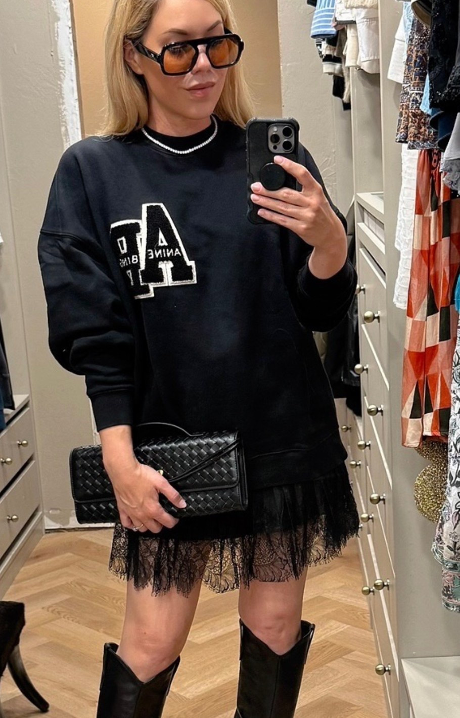 Anine Bing sweatshirt 
Lace skirt
Western boots 

#LTKSeasonal #LTKFindsUnder50