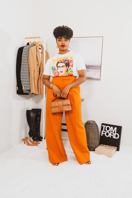 Styling Orange Tailored Pants
-Gabrielle tailored pants by Zara
-Frida Tee by Target
-Le Grand Bambino by Jacquemus
-Lange Sandals by Steve Madden


#LTKstyletip #LTKunder100 #LTKitbag