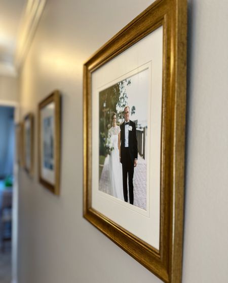 As soon as we got our wedding photo gallery back I knew I needed some hanging frames for them and wanted a custom look without a hefty price tag. I found this set of 4 11x14 frames matted for 8x10 photos and gave them a try! The frame set comes with a standard mat with an ivory and a white side, but to give them more of a custom feel I found a bevel cut ivory mat to replace the plain one. It easily elevated the look and now we have wedding photos hanging to fill our otherwise empty hallway from our living room to our kitchen. The frames I used just came back in stock in gold, and I’ve linked the items shown in this reel below!

Amazon frames, custom framing, custom mat, wedding photo gallery, affordable wall frames, frame ridge dupe, Amazon find, hallway frames 

#LTKfindsunder50 #LTKhome