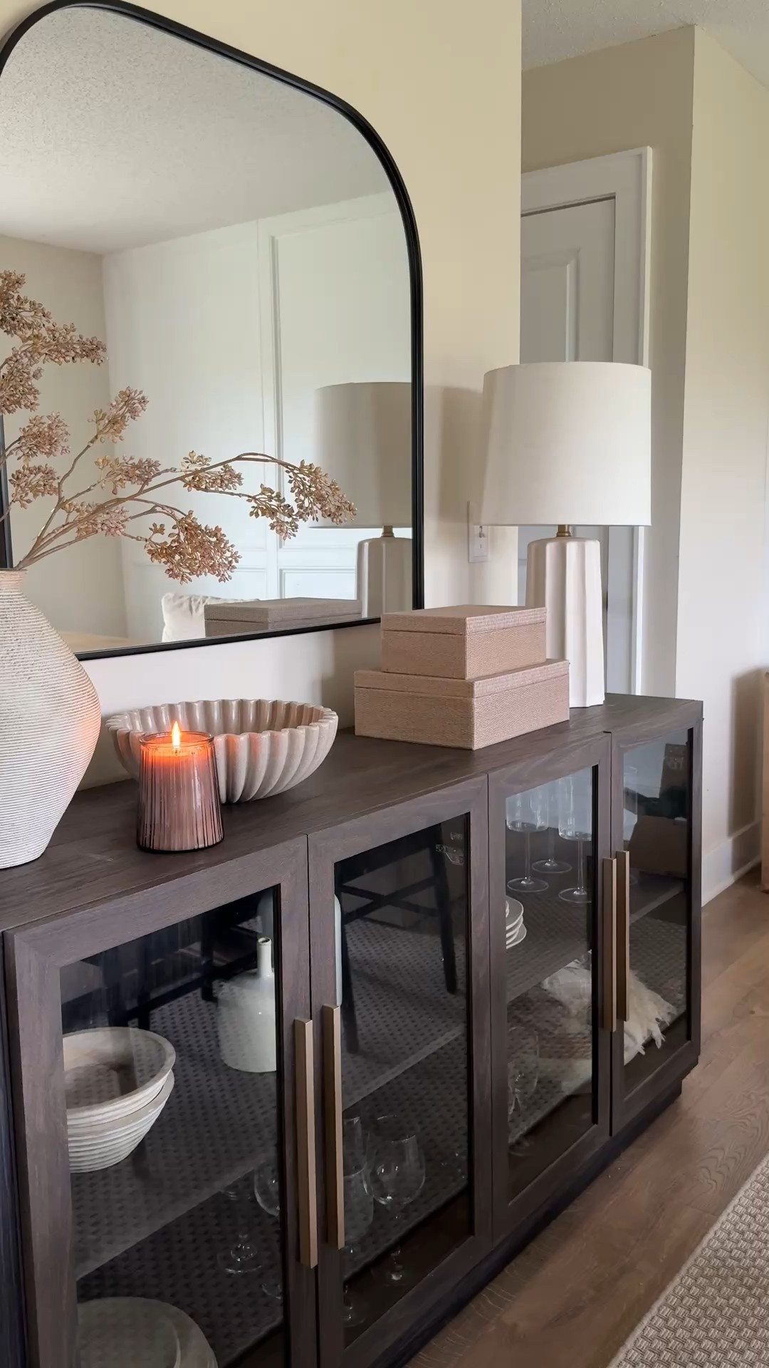 Sideboard fall decor styling, love this large arched mirror!

Sideboard, wall mirror, arched mirror, home decor, table decor, table lamp, vase, decorative boxes, decorative bowl , fall candle 

#LTKSaleAlert #LTKSeasonal #LTKHome