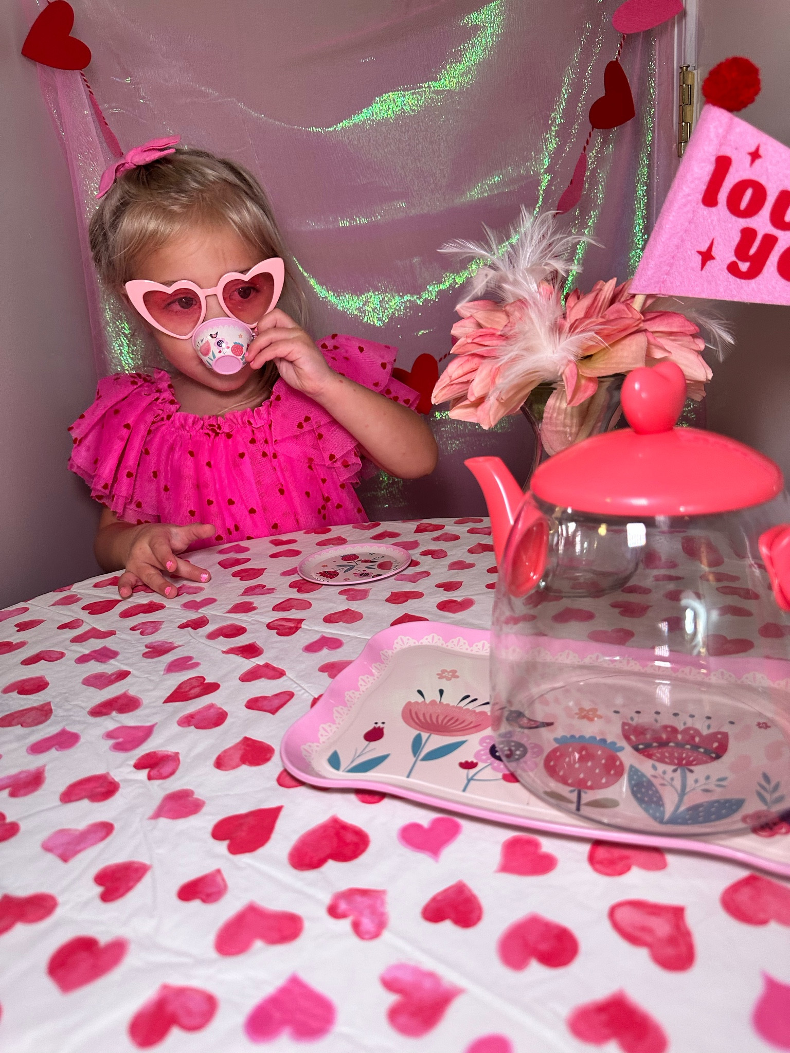 The most beautiful Valentine's Day dress for toddlers! This is a target exclusive and comes in Mommy and me sizes. The teapot and Phil Valentine's Day flag is from target dollar spot 💖

#LTKkids #LTKfamily #LTKSeasonal