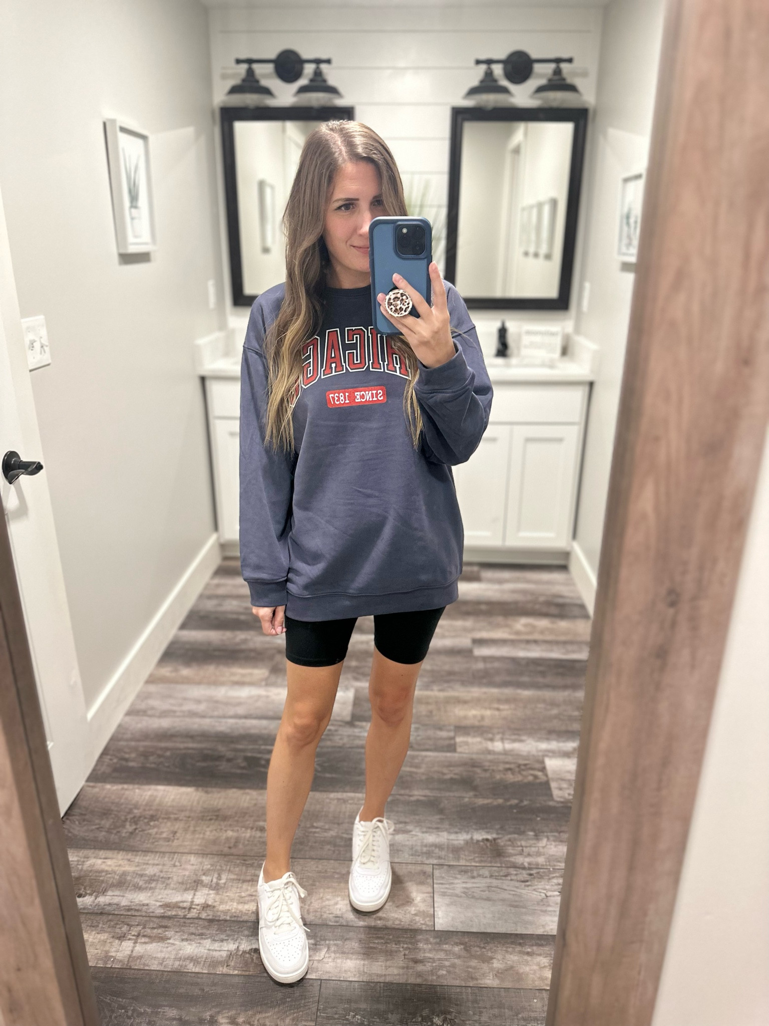 OOTD: oversized sweater, crop tank underneath, and biker shorts. Because my days start at 55 degrees and high is in the 80s 🥵  

#LTKstyletip #LTKSeasonal #LTKfindsunder50