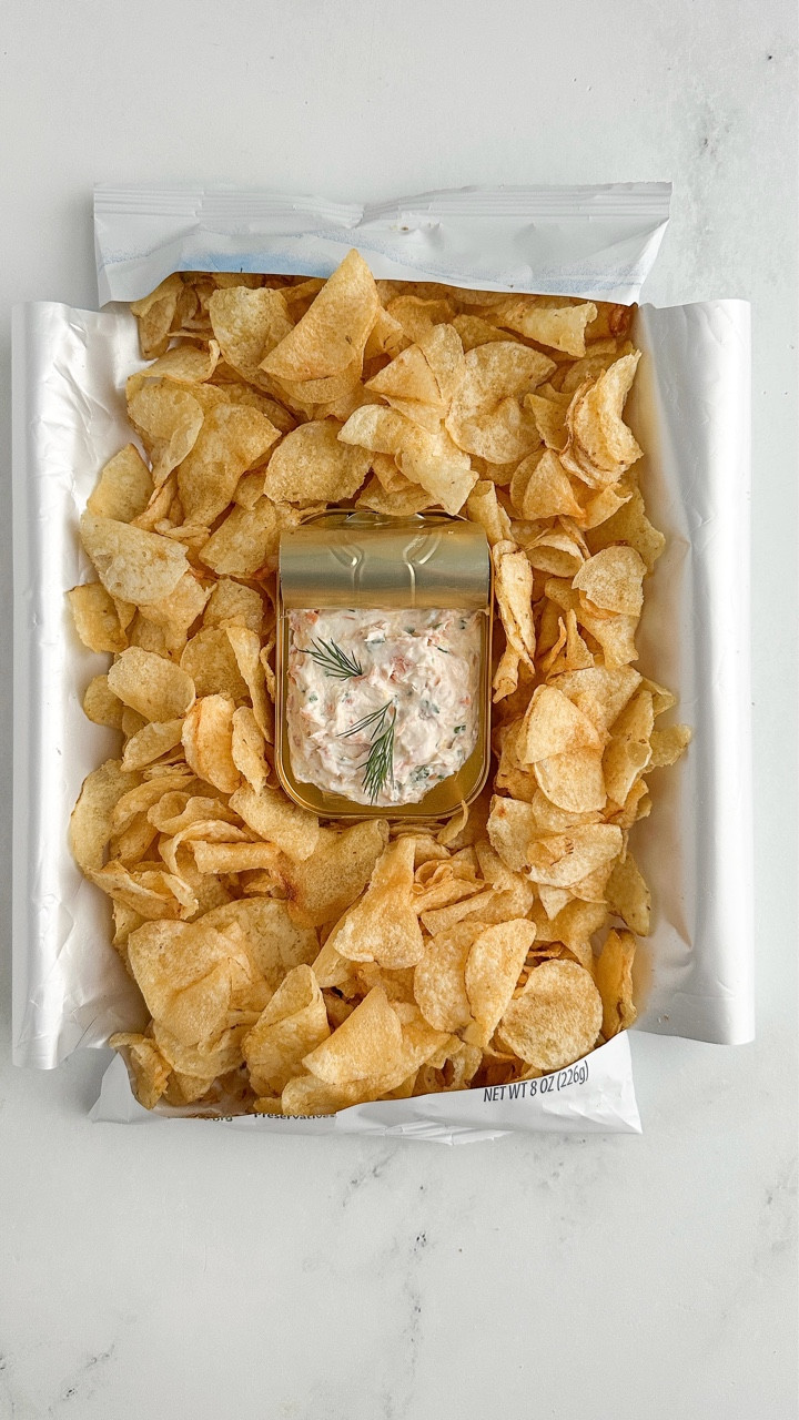 Holiday entertaining made easy! This smoked trout dip is served right in the tin, nestled in a bag of chips for a super fun presentation. Quick to make, creamy, and guaranteed to wow your guests. I used my fave @fishwife Smoked Rainbow Trout  for the best flavor; perfect for last-minute gatherings, snack boards, or cozy nights in. Comment “recipe” and I’ll send you the link!
.
.
.
.
#EasyRecipes #HolidayAppetizers #SnackTime #PartyFood #QuickRecipes #RecipeIdeas #SmokedTrout #SeafoodLovers #FishRecipes #SmokedSalmon #Fishwife #HolidayEntertaining #FestiveFood #PartySnacks #HolidayHosting #EasyEntertaining #DipLovers #ChipAndDip #SnackBoard #FunFood #CreativeServing #FoodieGram #InstaFood #Yummy #Delicious #Foodstagram #Partner