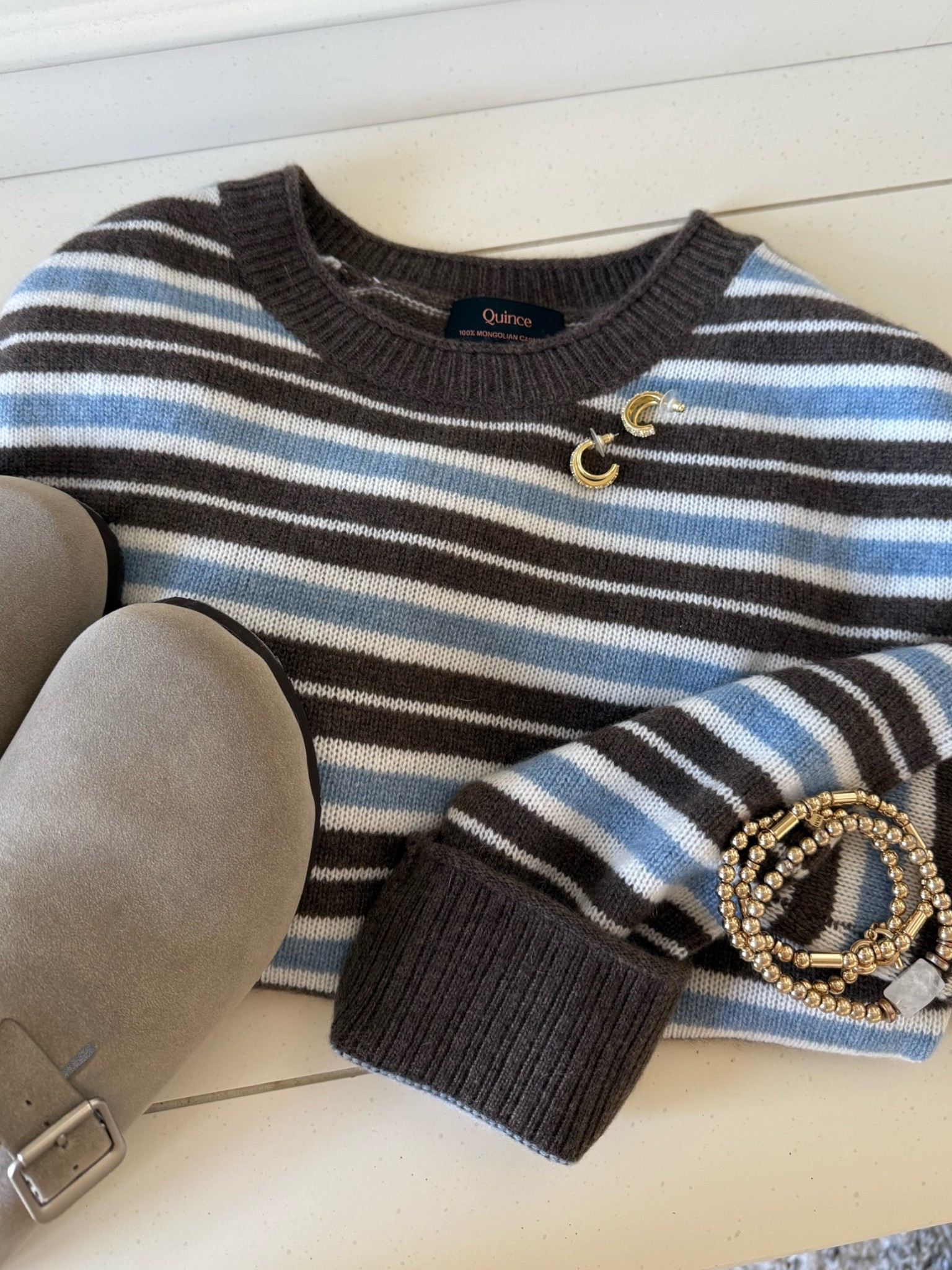 One of my favorite cashmere sweaters styled for fall! 🍂

This striped sweater is from @Quince 🤎 Style it with a pair of clogs and gold jewelry!

Quince sweater, brown and blue sweater, Kendra Scott earrings, fall outfits, fall outfit idea, fall fashion, cozy sweaters, fall sweaters, target shoes, Mongolian cashmere sweater, quince gifts