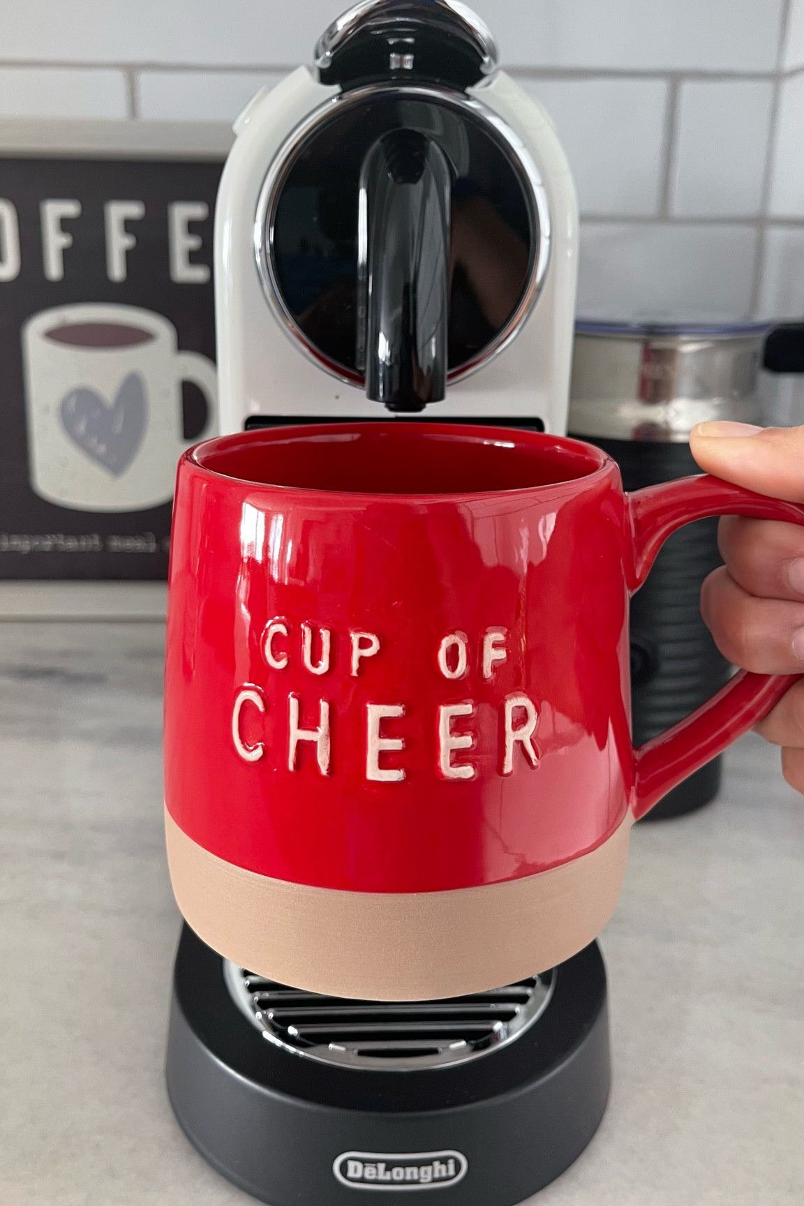 Holiday cup of cheer coffee mug from Michaels and my new favorite Nespresso machine, Nespresso CitiZ Coffee and Espresso Machine by De'Longhi with Milk Frother in White ☕️ #whitekitchen #coffee #christmasdecor

#LTKfindsunder50 #LTKHoliday #LTKhome