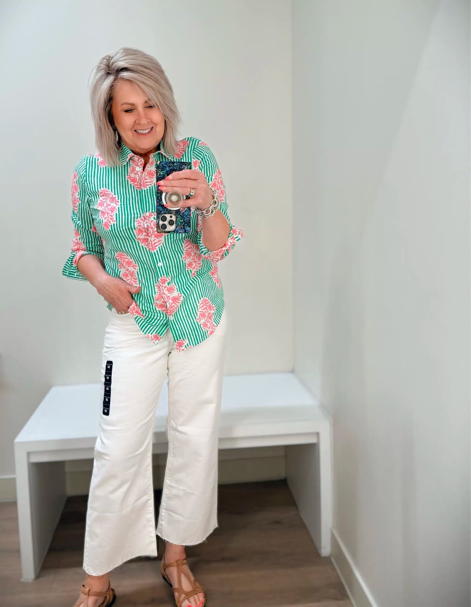 This pink and green top is a great piece to add some color to your outfit! I am wearing it with white jeans, but also styled it with some fun, pink jeans for a more seamless look. My top is a medium and my jeans are a 28, but I needed a 29.

#LTKootd #LTKOver40 #LTKMidsize