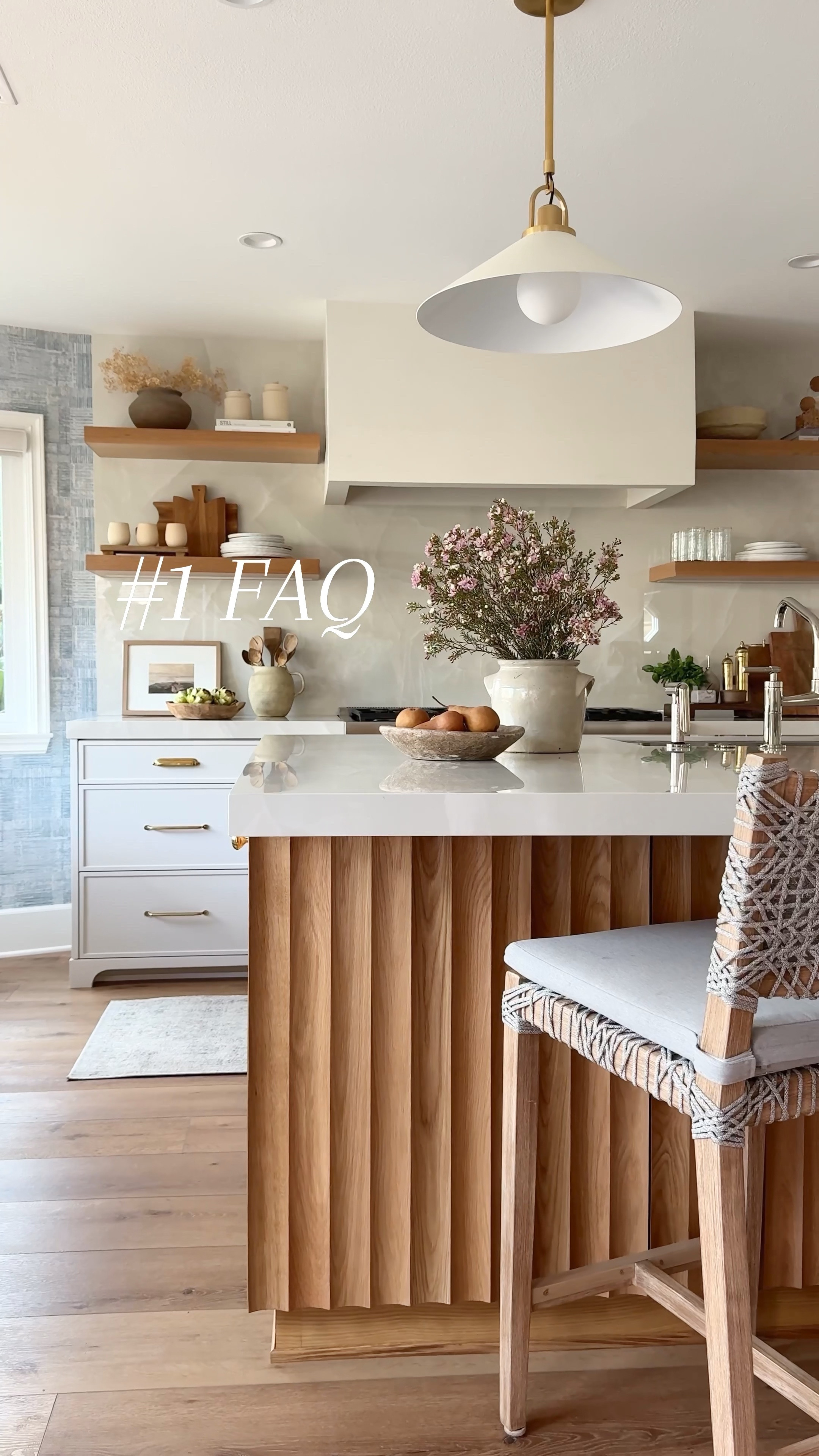 The number one question I get asked about our client's kitchen is the wood detail on the island. This is a custom design we did but I found one that looks exactly the same and more affordable!
It should be an easier install too because it comes in sheets. You can also stain it or paint it. This would look beautiful as a backing to a bookshelf or vanity. On sale for @Wayfair Way day. Up to 80% off and free shipping. Shop online and in store.

#Wayfair #WayfairPartner #WayDay 

Fluted wood Rattan chair white pendant light 

#LTKFindsUnder100 #LTKSaleAlert #LTKHome