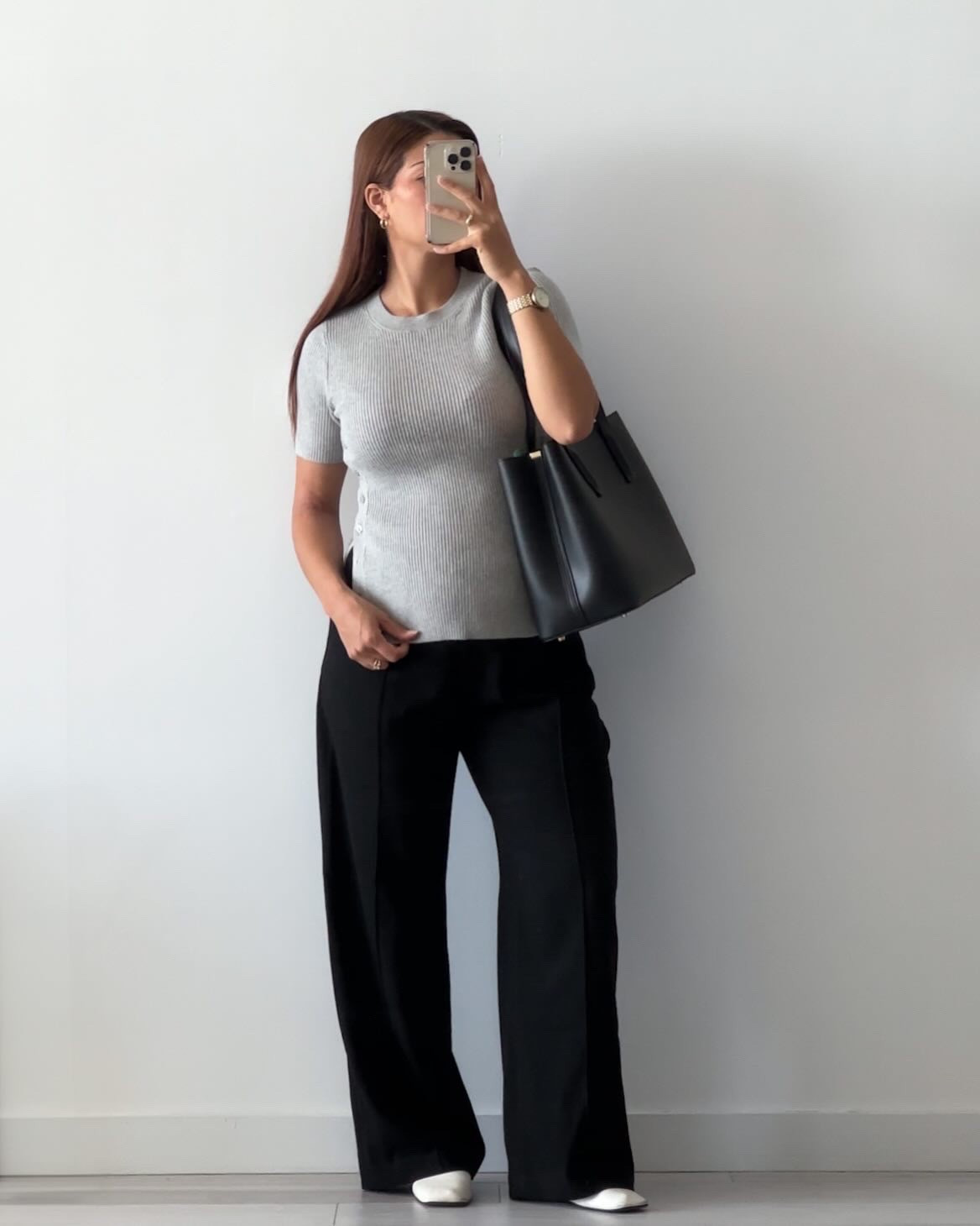 bump friendly workwear ootd —

OBSESSED with this top from @abercrombie for the bump and beyond. The buttons on the side can be adjusted as you grow/shrink. Will be ordering in another color for a closet staple 🤍

details:
top - @abercrombie, s, linked
pants - @gap, s, linked
shoes - @everlane, 7.5, linked
bag - @frejanyc, linnea tote, linked

links on @shop.ltk 🔗 

#workwear #officeoutfit #bump #bumpstyle #maternity #businesscasual #smartcasual