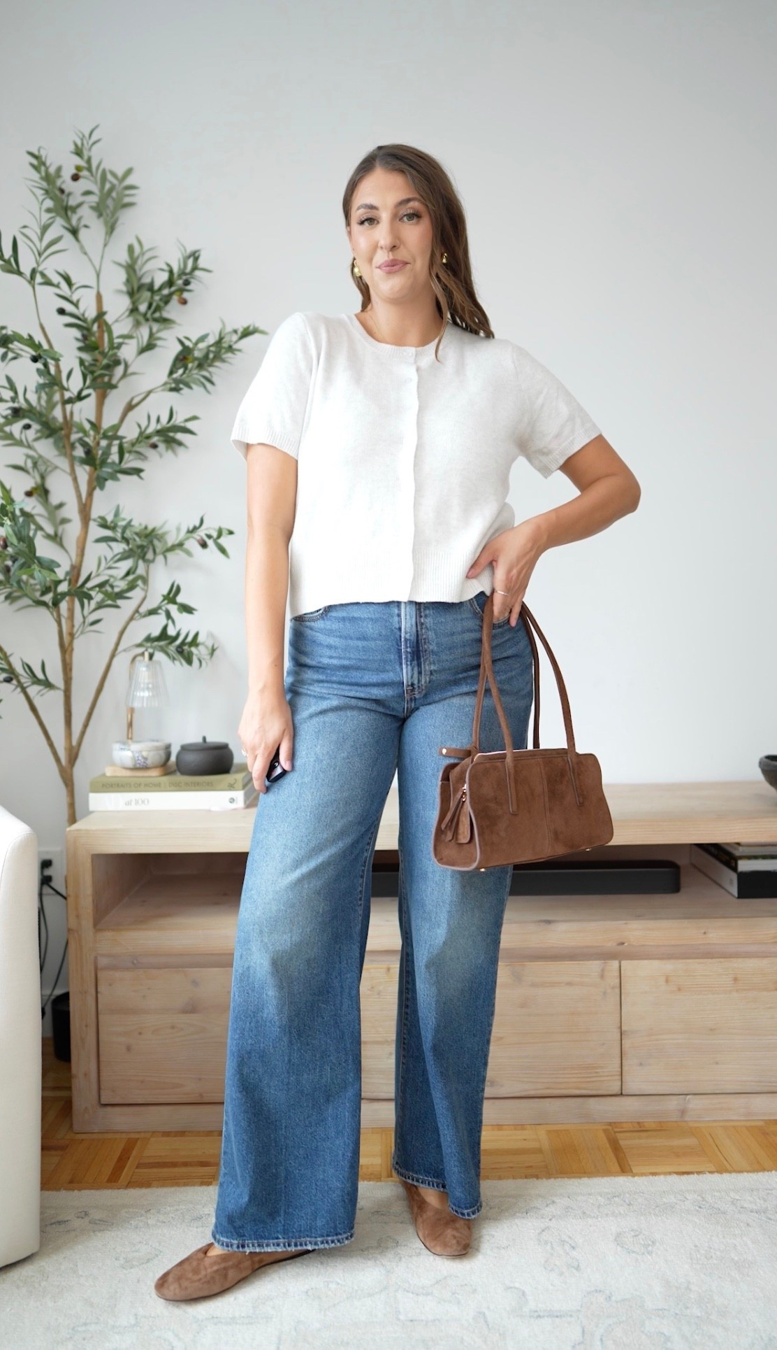 Easy fall styling with classic denim, a soft short sleeve cardigan, suede flats and a chocolate brown bag. The perfect polished-but-effortless outfit for transitional weather.

fall outfit, transitional style, wide leg jeans, cardigan outfit, suede flats, brown handbag, casual chic, everyday outfit, classic fall style, effortless fashion

#LTKootd #LTKSeasonal #LTKMidsize