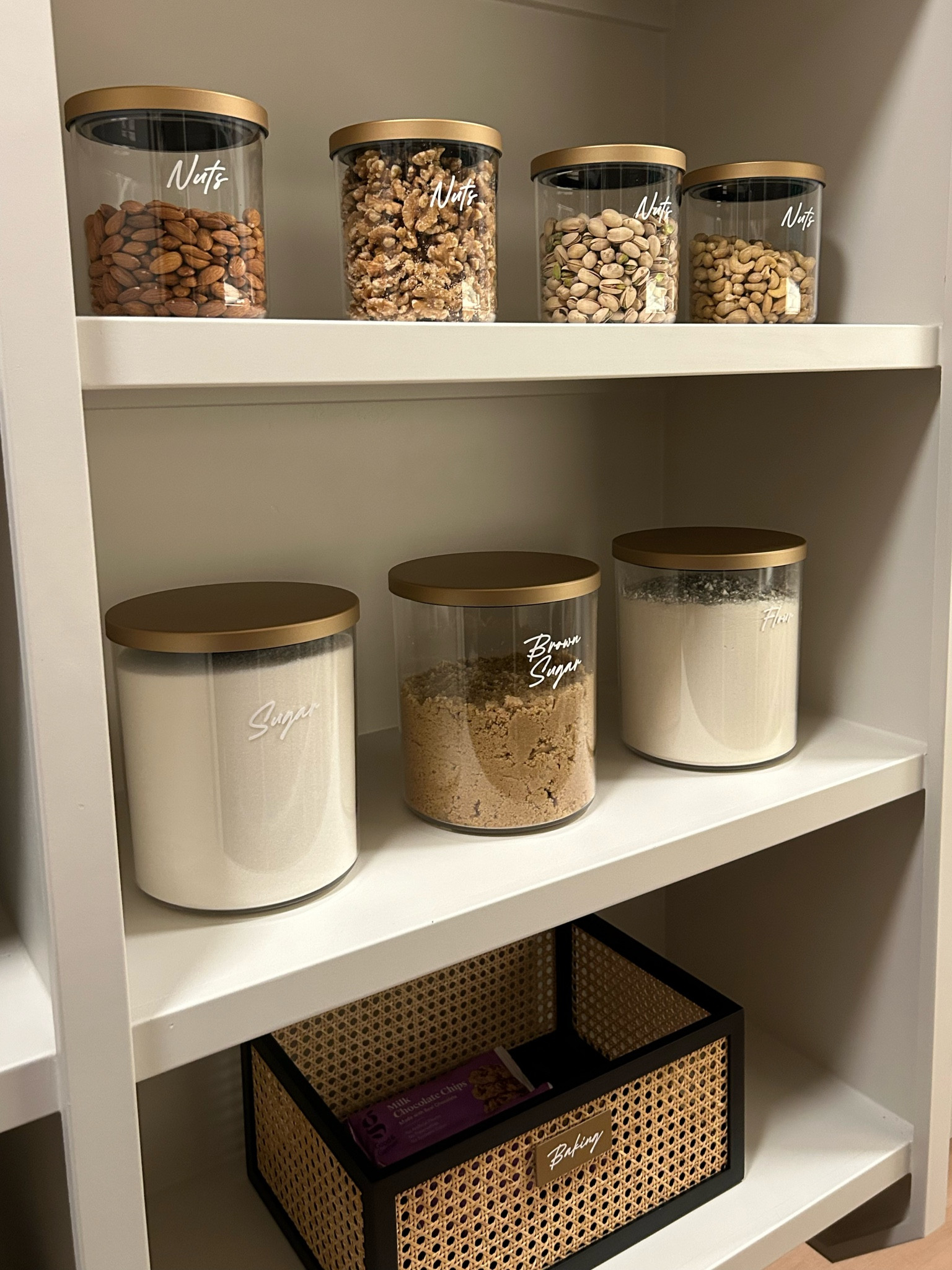 Organizing Tip: Canister Congruency 

Hey there, fellow organizers! Today, let's talk about a simple yet effective way to spruce up your kitchen or pantry: canister congruency. It's all about bringing harmony to your storage solutions and creating a cohesive look that's both functional and stylish.

1. **Choose Your Canisters**: Start by selecting canisters that not only fit your storage needs but also complement your kitchen aesthetic. Whether you prefer glass, ceramic, or stainless steel, opt for a set that speaks to your personal style.

2. **Consistency is Key**: Keep things uniform by using canisters of similar sizes and shapes. This consistency not only enhances the visual appeal but also makes it easier to stack and arrange your canisters neatly.

3. **Label with Style**: Add a personal touch by labeling your canisters with stylish tags or labels. Whether you prefer classic chalkboard labels or modern acrylic tags, make sure they're easy to read and enhance the overall look of your storage space.

4. **Organize with Purpose**: Take stock of your pantry essentials and prioritize items that you use frequently. Store these in easily accessible canisters on your countertop or within arm's reach in your pantry. Reserve larger canisters for bulk items or less frequently used ingredients.

5. **Maintain the Look**: Keep your canisters clean and tidy to maintain their aesthetic appeal. Regularly wipe them down and refresh your labels as needed to ensure everything stays organized and visually pleasing.

By embracing canister congruency, you'll not only streamline your storage solutions but also elevate the look of your kitchen or pantry. Happy organizing!

---

Feel free to customize it further to fit your personal style and preferences!