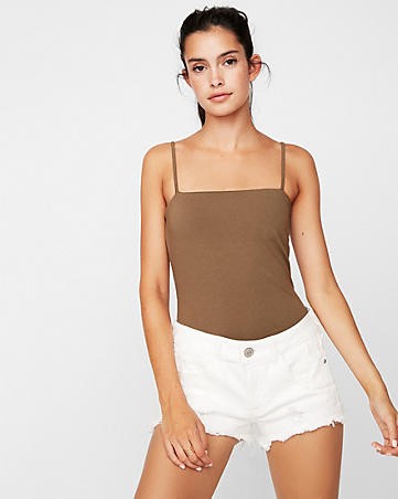 Low Rise Relaxed Raw Cut Destroyed Stretch Denim Shorts | Express