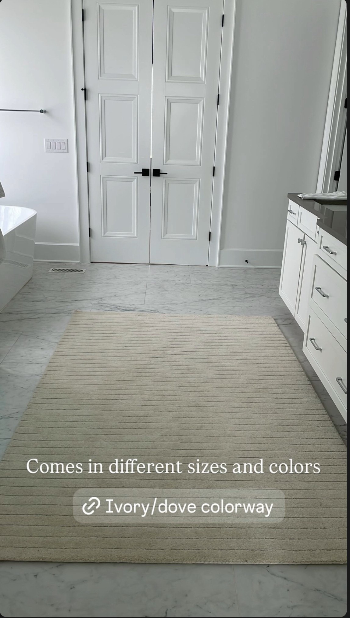 This is a medium tufted pinstriped rug that I used in my primary bathroom to soften the look of all the stark white. 

#LTKFamily #LTKStyleTip #LTKHome