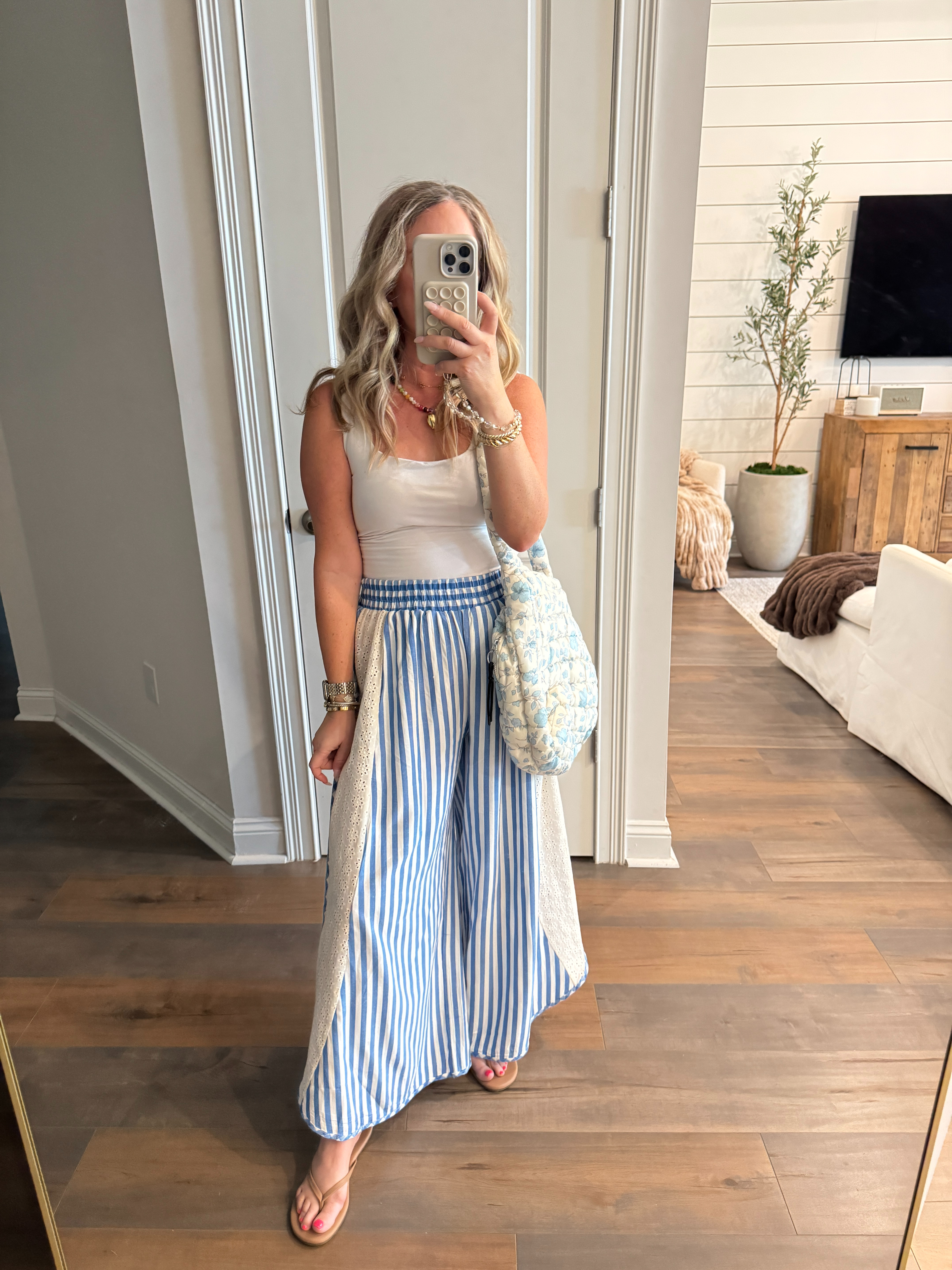 How fun are these striped pants?! They have a cute lace detail down the sides. Pair with a basic tee or tank and you're ready to go!

Amazon fashion finds, summer outfit inspo, styled look, blue floral quilted bag, everyday fashion, blue hues, mom life, what I wore, ootd, cute style, throw on and go, vacation inspo, resort wear, affordable fashion finds.  

 #LTKootd #LTKmomlife #LTKTravel