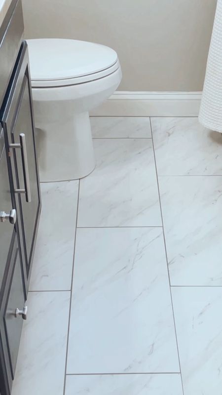 Vinyl tile is super durable and a quick and inexpensive way to update flooring without gutting the old tile. This version can be grouted which gives a really polished look. 
#ltkfind #competition

#LTKFind #LTKhome