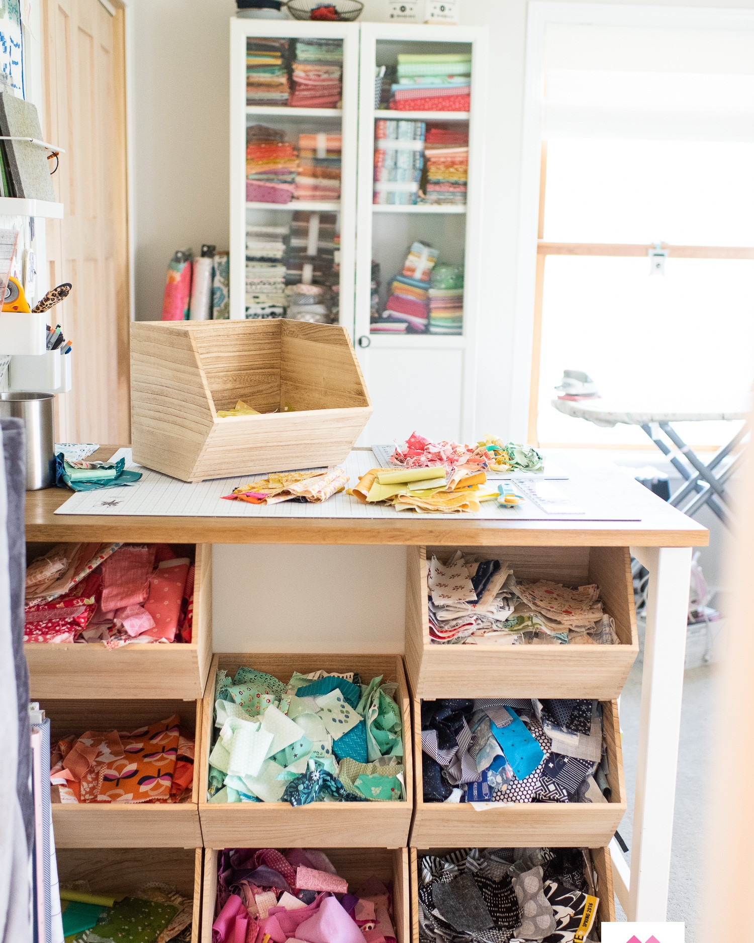 These scrap bins are one of my favorite things in my sewing room.  It’s easy to add to them and I’m constantly tempted to use them.  

Mine are the Large size.

My cutting table is an ikea freestanding kitchen island.  
