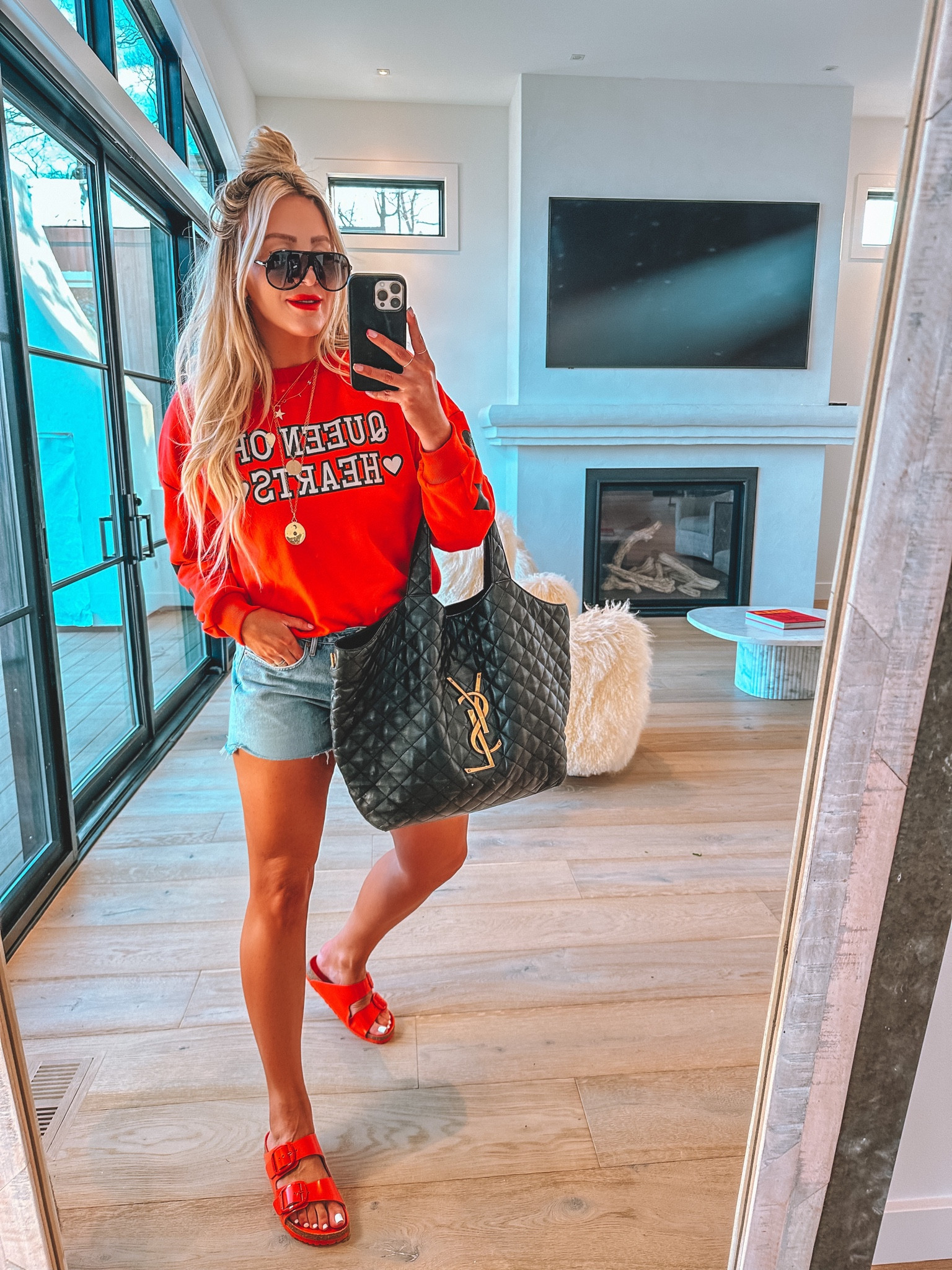 Wearing a medium in sweatshirt .. denim shorts and sandals run tts 