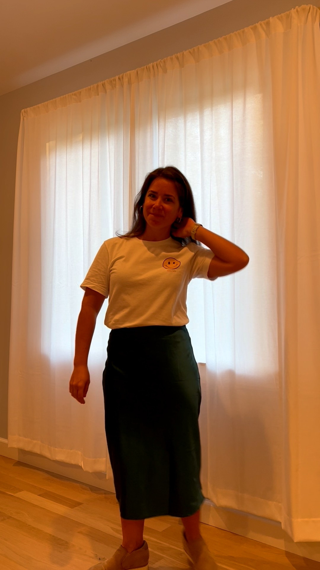 Wearing the satin skirt in dark green (size small). It is more of a teal color than a true dark green. 

Paired with a personalized graphic tee- other fun styles are paired below.

Cute and comfortable Dr. Scholls wedge sneakers finish off the look. 

#LTKFindsUnder50 #LTKPetite #LTKStyleTip