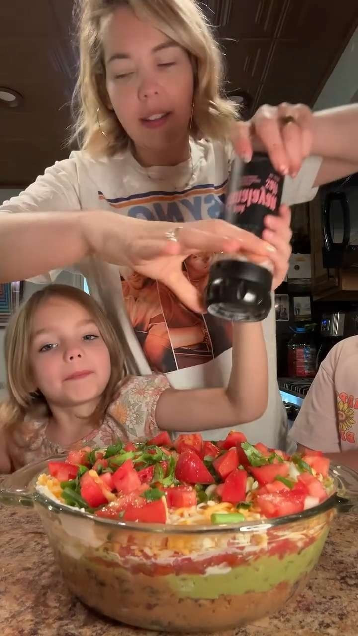 7 Layer Dip recipe!🥑🍅 Sharing my NSYNC graphic band tee & similar too. 

 #LTKootd #LTKfoodie #LTKvlog