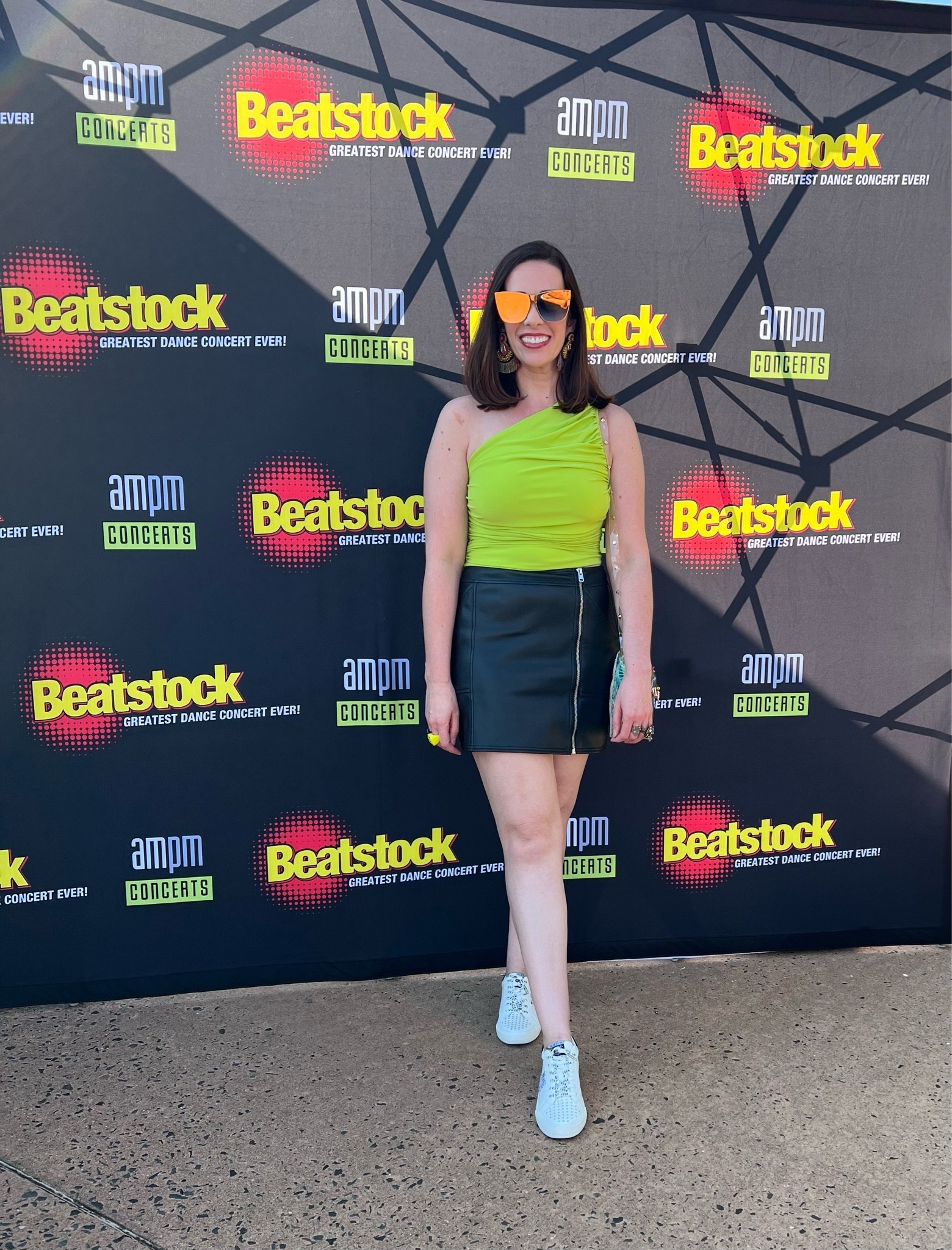 Lime green ruched top (s). Black leather zipper skirt (4). Black and white sneakers (8.5). #ruchedtop #top #greentop #limegreentop #skirt #leatherskirt #miniskirt #blackskirt #sneakers #blackandwhitesneakers #concertoutfit #summeroutfit 
concert outfit ideas

#LTKootd #LTKSeasonal