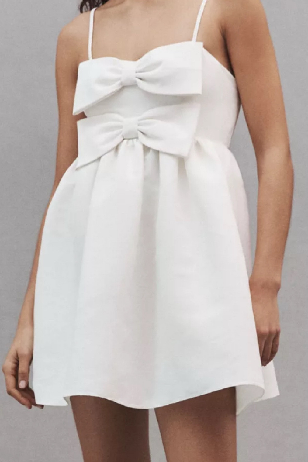 Gorgeous short white dress with bows! 

#LTKStyleTip #LTKFindsUnder100 #LTKWedding