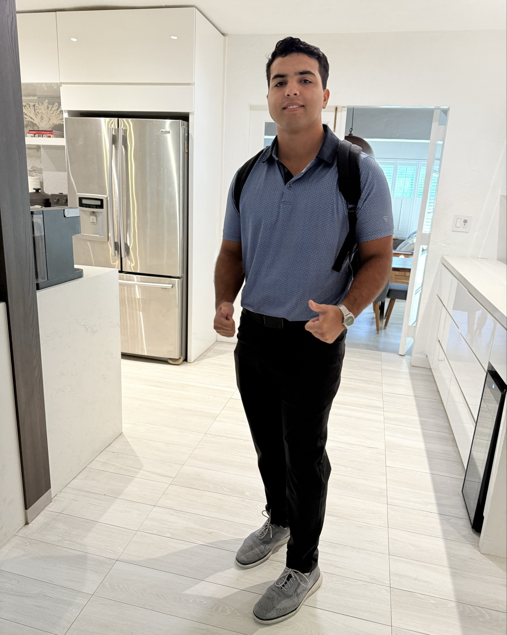 
The men's golf shirt is available in a variety of colors and sizes, catering to different preferences and body types. After trying on several options, he decided to go down one size for a more fitted look, and it turned out to be a perfect choice. The shirt not only fits comfortably but also allows for ease of movement, making it ideal for both casual wear and performance on the course. 

#LTKFindsUnder100 #LTKMens #LTKWorkwear