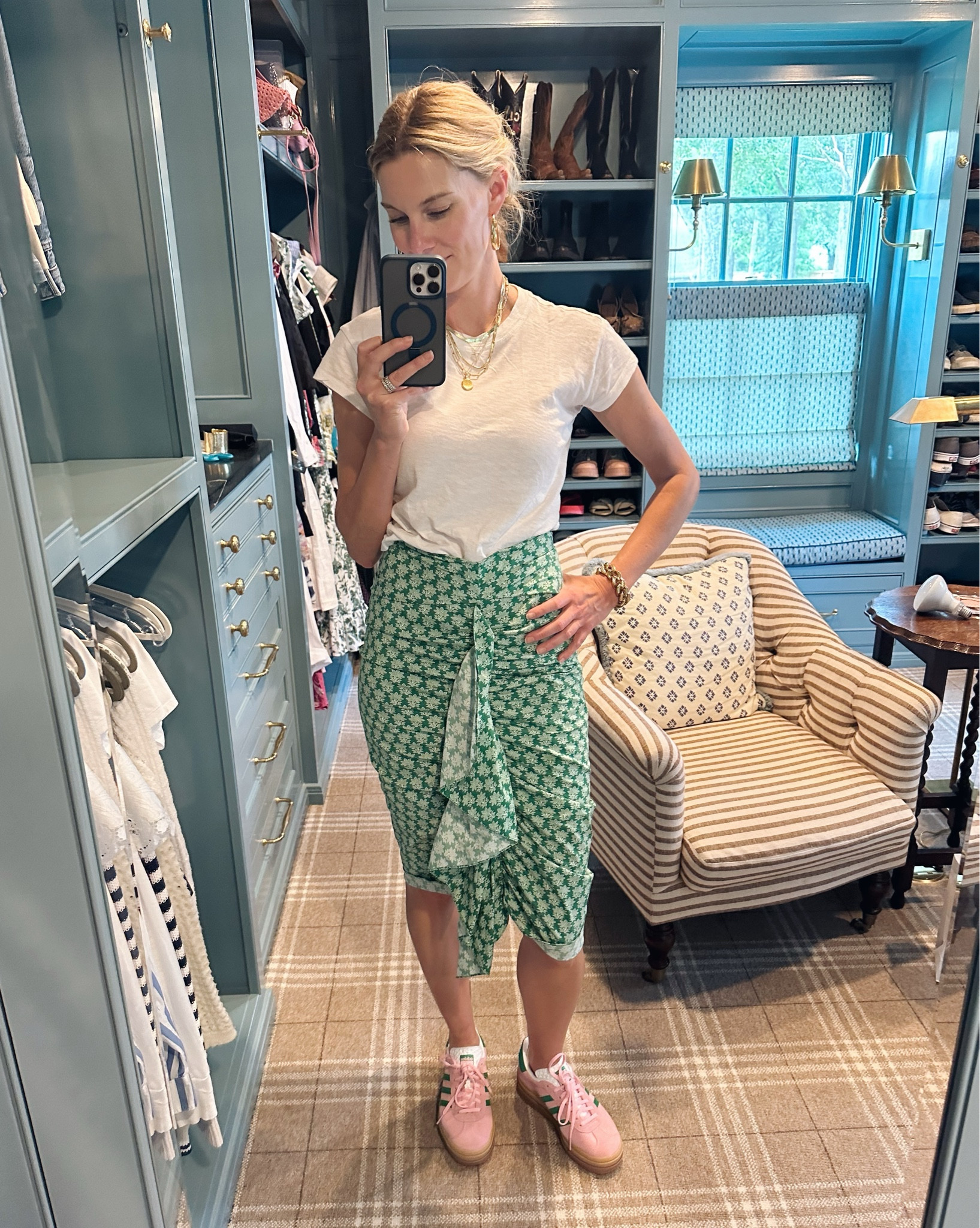 Technically, the ruffle on this skirt is supposed to be on the side, but I throughly it looked cute in the front! Im wearing an xs in the tee, and I had to go down an entire size and a half in my Adidas sneaker. 