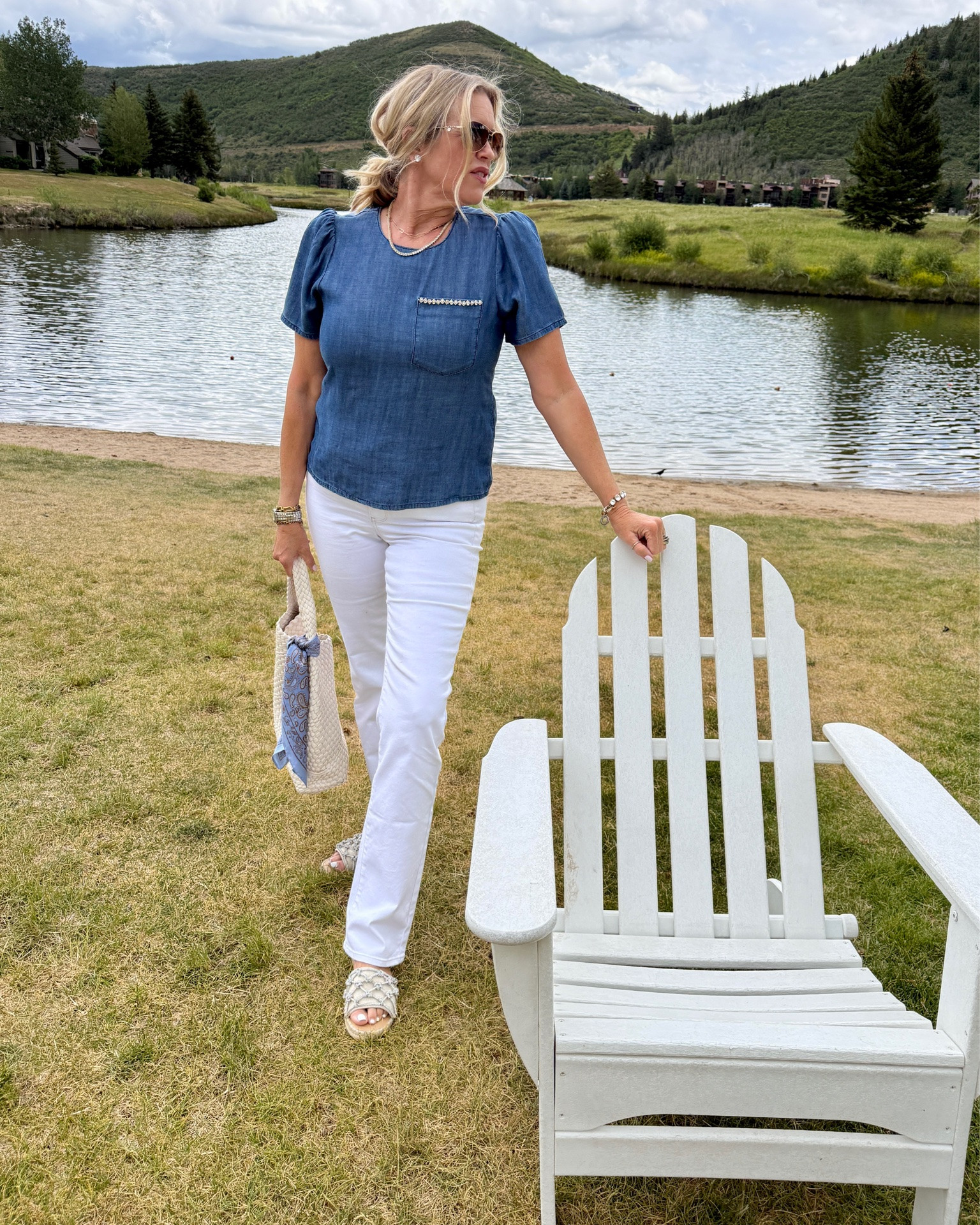 Denim and white.. with a touch of bling… 

Perfect if you like an understated  4th of July outfit💙🤍🇺🇸

Great from a costal vacation or perfect for everyday summer outfit✔️

NYDJ is always a good pick, always fits right, (if you know your sizing with them) I wear tts and get a 4/sm 

-Wearing the chambrey cap Steve top with bling detain trim on crewneck and pocket detail… 

- White denim straight leg jeans - fit so good, I am wearing the tall length ( I am 5”9)  

Bride slide espadrille sandals on sale by Chicos and so good comfy and cute 

Woven bag mine was from anthropology.. I linked same one but from department store and some other more affordable options 

Tied sold scarf on bag 

Manufactured diamond stud earrings 6 ct

Diamond tennis necklace 
Linked mine and affordable options as well

#LTKootd #LTKOver40 #LTKSaleAlert