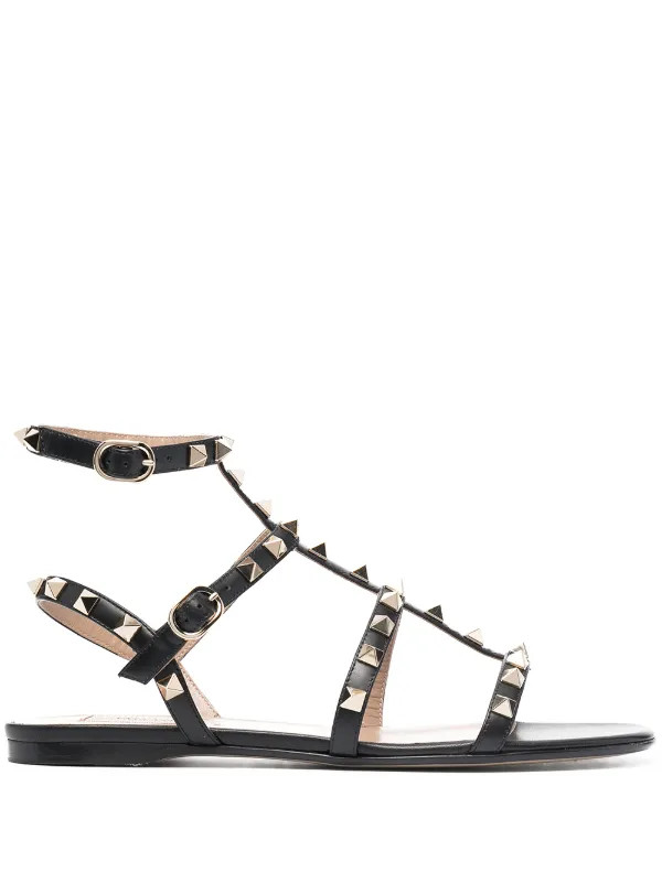 Valentino Garavani Rockstud Strappy Sandals | Black | FARFETCH | Farfetch Global