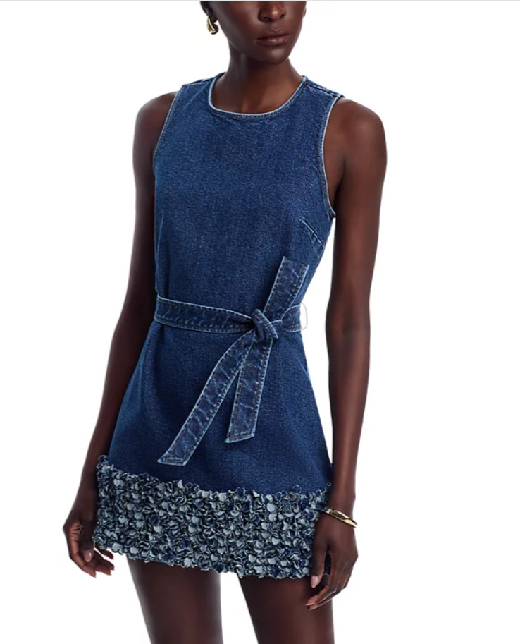 Feminine and modern, this Petal Mindie denim mini dress brings effortless charm to any look. Made from soft cotton denim with a touch of stretch, it features a round neckline, sleeveless silhouette, and a removable self-tie belt that flatters the waist. The ruffled trim at the hem adds a playful texture, creating a chic balance between structure and movement. Perfect for day-to-night styling — pair it with flats for casual outings or heels for an elevated edge. Click to explore this standout denim essential.

#DenimMiniDress #CasualChic #SummerStyle #EffortlessLook

#LTKStyleTip #LTKPetite #LTKSeasonal