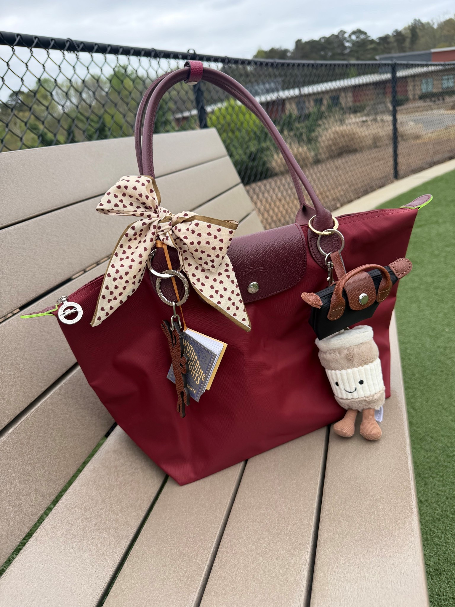 Bag of the day ♥️
Medium Longchamp Le Pliage green in pomegranate 
Wuthering heights book charm from Etsy
Jelly cat inspired to go coffee cup bag charm
Mini coin pouch charm from Amazon
Longchamp key ring 

#LTKdayinmylife #LTKWorkwear #LTKootd