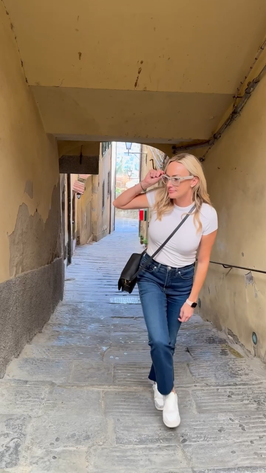 Sightseeing in Tuscany wearing comfy (and super stretchy for all the pasta eating) jeans, basic white ribbed t-shirt and my Ray-Ban Meta glasses. You can take pics and videos by tapping a button (as seen in the video) or you can say “hey Meta, take a picture,” for hands free capabilities! My Metas were amazing for visiting Italy. Highly recommend! They also translated signs to English for me hands free- “Hey Meta, what does this sign say in English?” 

#LTKTravel #LTKOver40