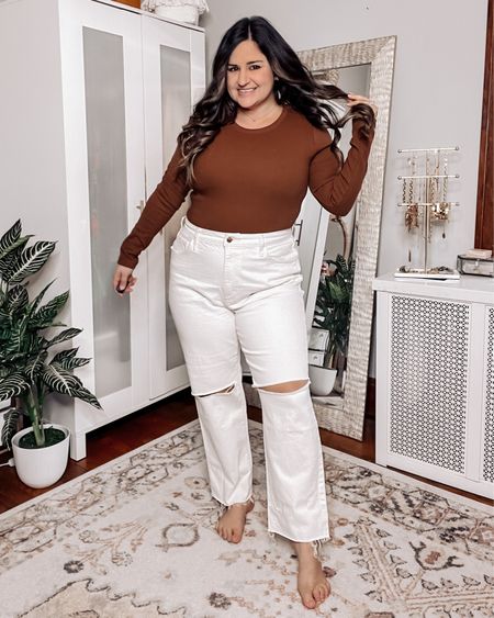 Wearing an L in this chocolate bodysuit by nuuds!

Wearing a 14 in the high waisted wide leg jeans

Casual outfit, bodysuit style, white jeans, distressed denim 

#LTKunder100 #LTKcurves