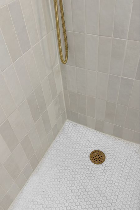 Gold shower drain 

#LTKfindsunder50 #LTKhome #LTKstyletip