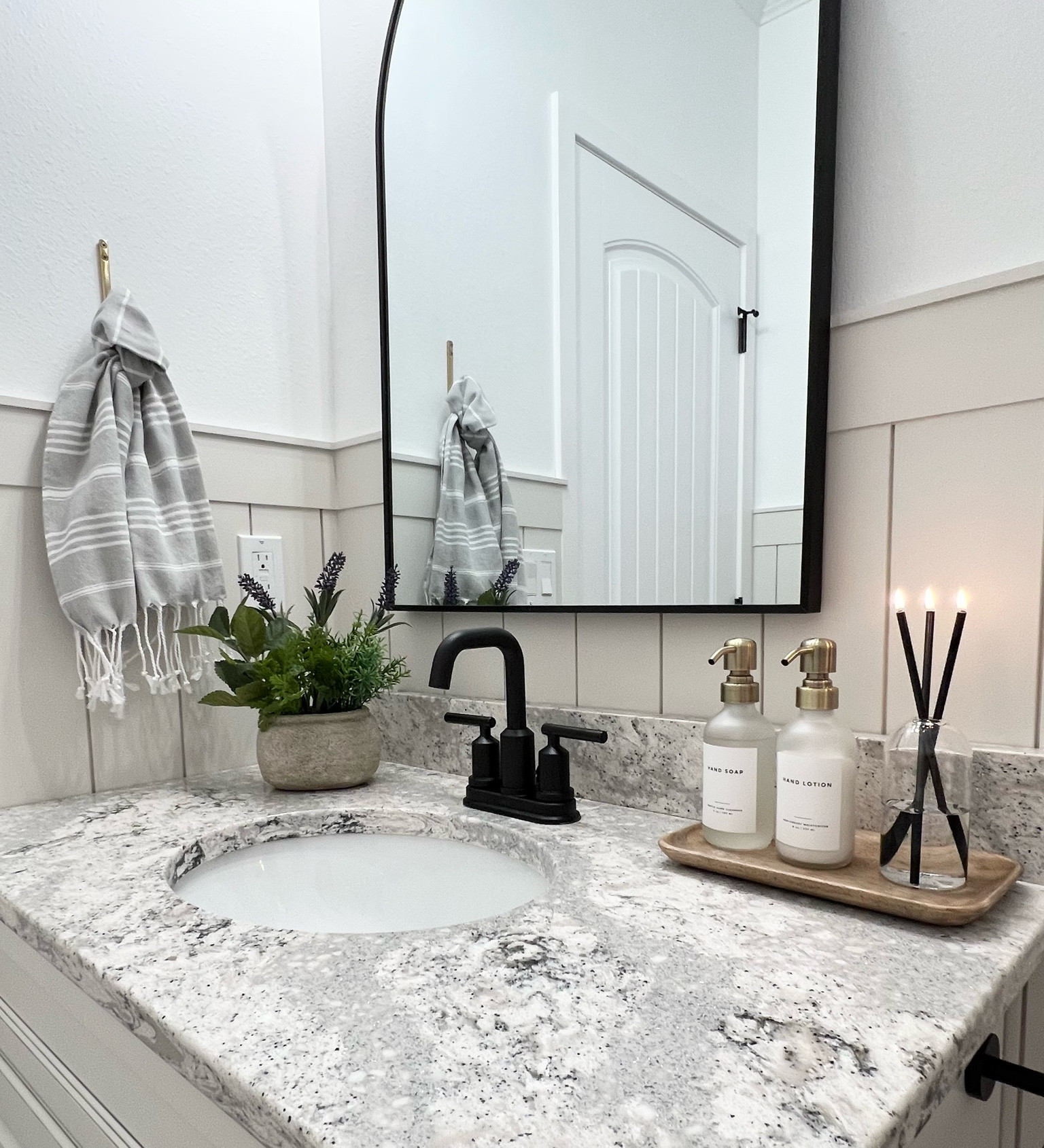 Bathroom decor / soap bottles / glass bottles / gray / hand towels / black faucet / Target finds / faux plant / everlasting candle / arch mirror / linen towel / Amazon home / modern farmhouse / neutral decor 

#LTKunder50 #LTKunder100 #LTKhome