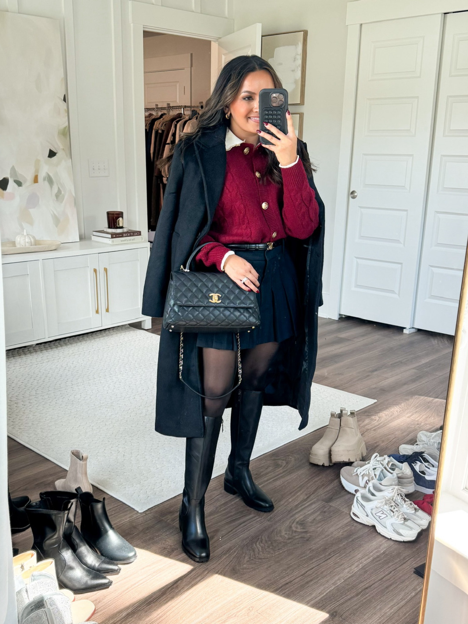 Use code SWEATERSAF for an extra 15% off my trench coat & mini skort! 
Code valid through 10/14! 

Black wool trench coat size XS petite - Sized up a size so I can button it over thick sweaters 
Red cable knit cardigan size XS TTS White ruffle polo sweater size XL girls TTS 
Black mini skort size S TTS - usually a size 2 / 26 
Black tights size small TTS 
Black boots size 5.5 TTS 

London outfit 
Fall fashion
 Fall family photos 
Cardigan
 Office outfit 
Fall outfit 
Fall style 
Petite outfits 
Europe travel
 Europe outfit

 Honey Sweet Petite Honeysweetpetite

#LTKSeasonal #LTKStyleTip #LTKSaleAlert