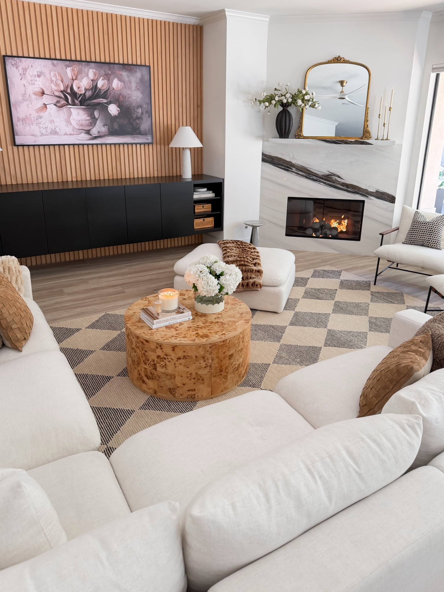 I can’t get over how much this new Loloi x Chris Loves Julia Francis rug transformed our living room 🤍. This is the beige / charcoal colorway. 

I’ve been eyeing this beige/charcoal checkered rug since we moved into this house, and it was exactly what this space needed to finally pull everything together. The texture, pattern, and cozy feel are SO good.

And the best part? It’s currently over 50% OFF 👏 on @Wayfair 

If you’ve been looking for a neutral checkered rug, cozy living room inspo, or affordable designer-style rugs, this is your sign. 

#cljxloloi #loloirugs