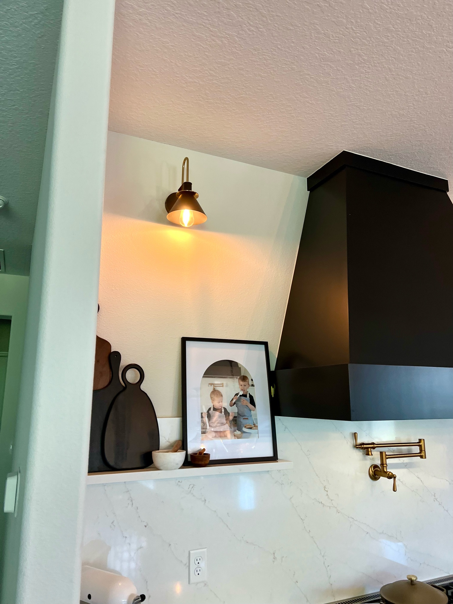 These matte black and gold accent lights are such a favorite of mine- they make the space feel stylish and warm! 

#LTKFindsUnder50 #LTKU #LTKHome