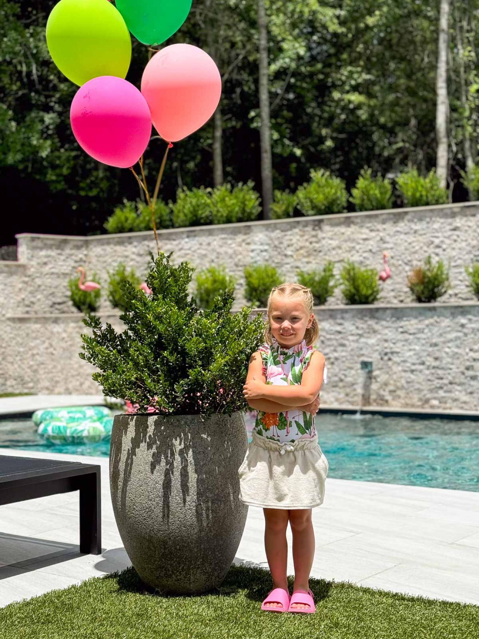 Eliza’s fifth birthday was a flamingo themed pool party. The decor, from balloons to flamingo floats was so easy to do and she had a blast! kid’s birthday pool party outdoor decor pink slide sandals stone planter terry cloth skirt swimsuit 

#LTKParties #LTKSwim #LTKKids