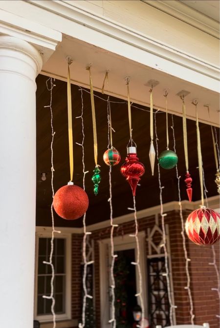 DIY Outdoor Hanging Christmas Ornament Display. 

#LTKHoliday #LTKSeasonal #LTKhome