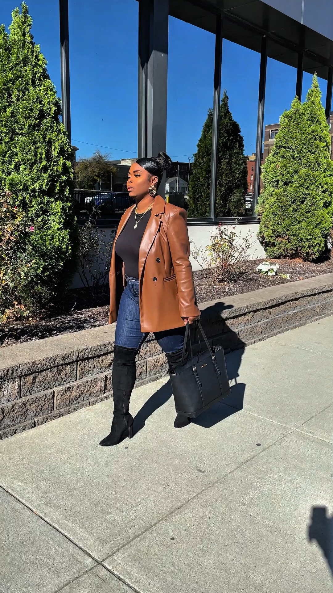 Black thigh high boots and a brown faux leather blazer. Fall and winter outfit inspiration. 

#LTKMidsize #LTKStyleTip #LTKU