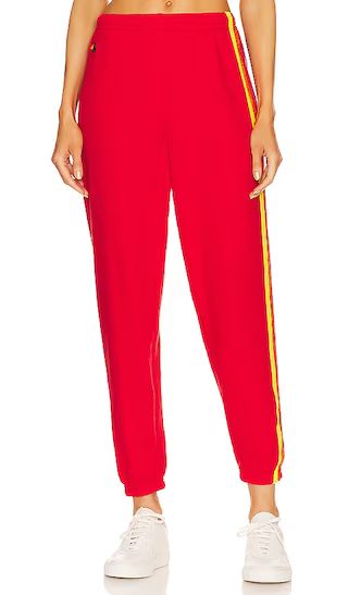 5 Stripe Sweatpant in Red & Yellow Purple | Revolve Clothing (Global)