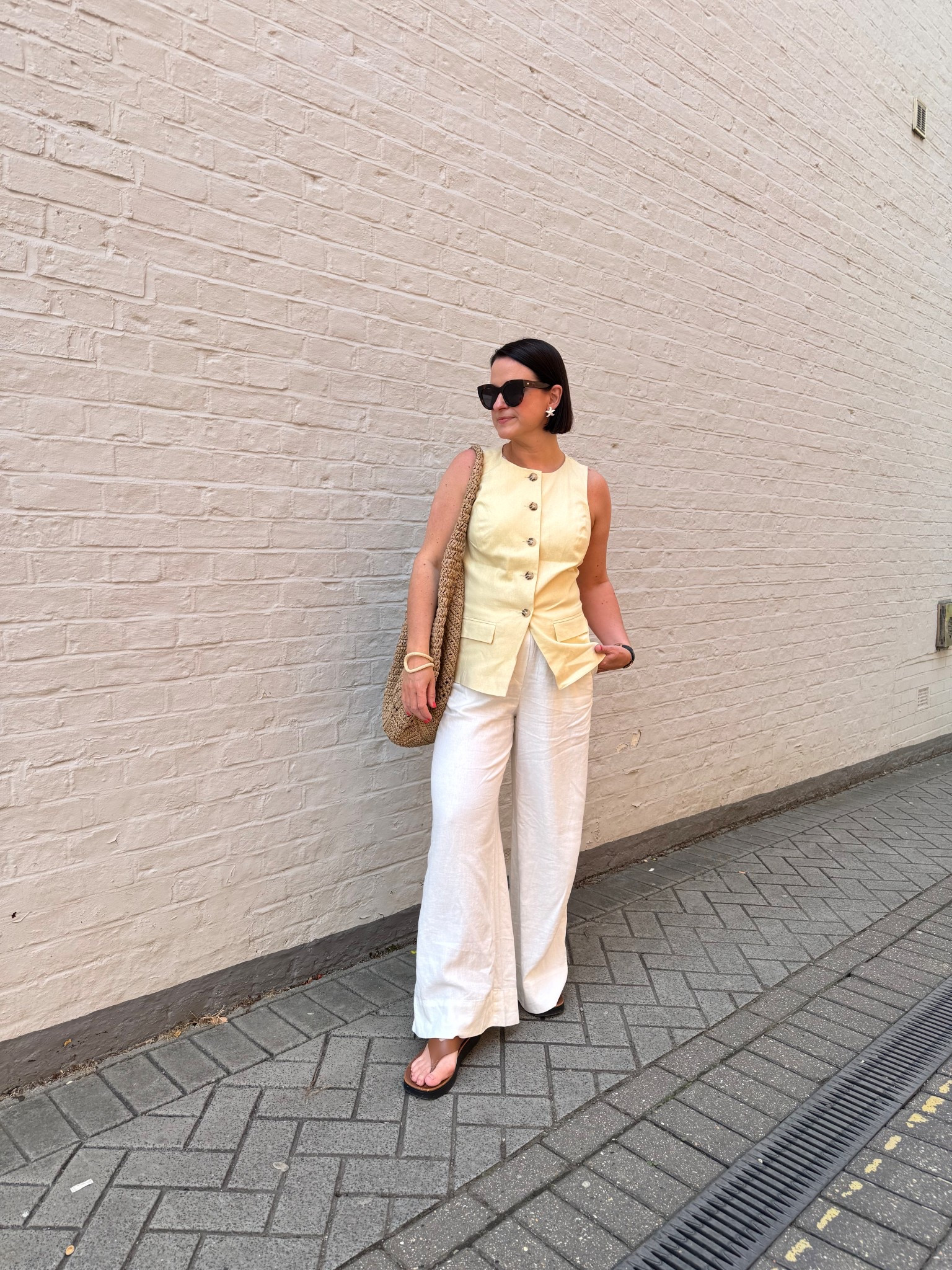 Butter yellow 
Linen blend waistcoat
Linen trousers
Raffia Oversized Tote Bag

I am wearing a size 14 in the waistcoat and am 34D bust.
I am wearing a size M in the trousers 

#LTKuk #LTKsummer #LTKeurope