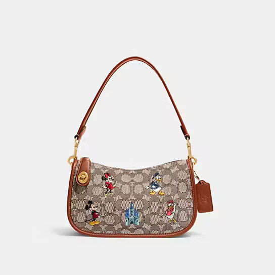 Disney X Coach Swinger Bag In Signature Textile Jacquard With Mickey Mouse And Friends Embroidery | Coach (US)