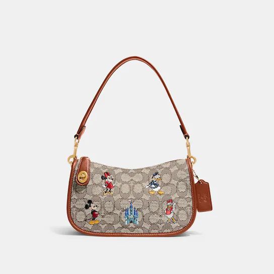 Disney X Coach Swinger Bag In Signature Textile Jacquard With Mickey Mouse And Friends Embroidery | Coach (US)
