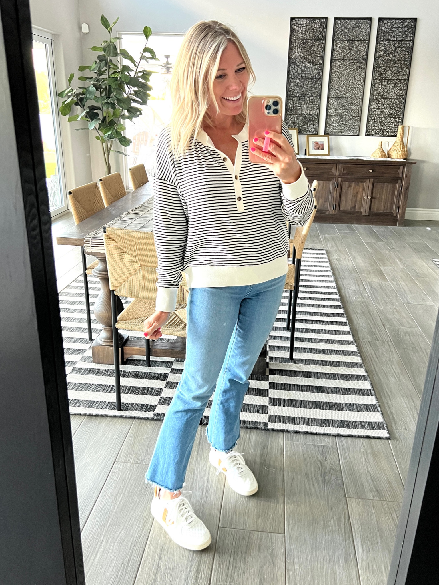 Love this striped henley (similar) with cropped bootcut jeans, white vejas sneakers. 26 jeans and 8 sneakers. Casual everyday outfit ideas 

#LTKstyletip #LTKSeasonal #LTKshoecrush