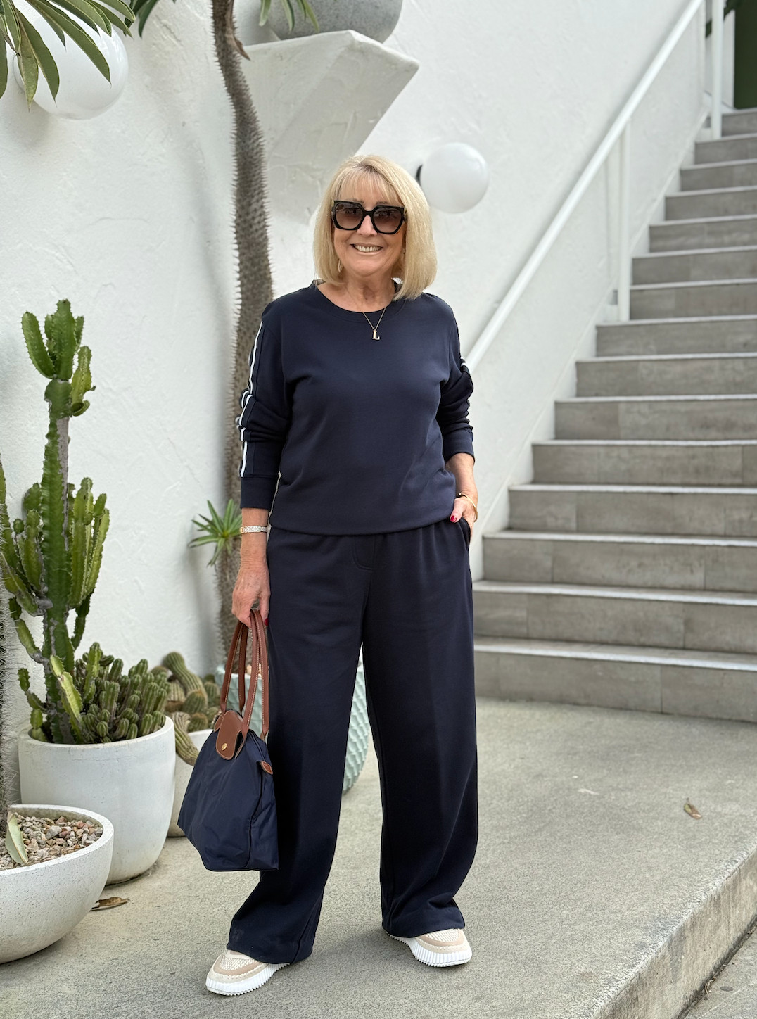A tracksuit that is both comfy and stylish, great for loungewear, running to the grocery store, or long haul travel.  

 #LTKaustralia #LTKtravel #LTKover50style
